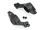 Two black plastic RC rear hub carriers and two small metal grub screws isolated on a white background.