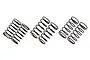 Three pairs of black metal RC suspension springs arranged on a white background.