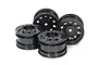 A set of four black Tamiya 1.9-inch semi-truck RC rims arranged on a white background.