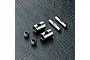 MST CVD rebuild kit parts including two metal barrels, two pins, and two grub screws on a black textured surface.