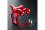 A red anodized aluminium RC car front upper deck connector component with included hardware, screws, and spacers on a dark textured surface.
