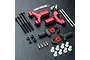 MST red aluminium front lower suspension arm set for RC cars, including metal arms, screws, plastic bushings, and pivot pins on a black textured surface.