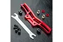 MST red aluminium front shock mount set with adjustment tool and included hardware on a black textured surface.