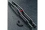 MST carbon fibre upper deck set featuring two carbon plates, a red aluminium brace, and included screws and washers on a textured black surface.