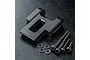 A black aluminium MST rear upper deck connector with four matching screws and four washers on a textured black surface.