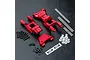 MST red aluminium rear lower suspension arm set including metal pins, screws, plastic bushings, and MST logo stickers on a black textured surface.