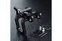 MST black aluminium front upper deck connector set for RC cars, including mounting hardware and a small logo sticker on a textured black surface.