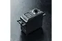MST SC-0352 RC servo motor in black plastic casing, viewed from a high angle against a dark textured surface.