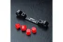 MST black aluminium adjustable suspension pin mount with four red plastic inserts on a black textured surface.