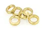 A group of six small brass-coloured metal oilite bushings arranged on a white background.