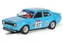 A 1/32 scale Scalextric Ford Escort Mk1 slot car in light blue livery with racing number 57, featuring sponsor decals and a driver figure.