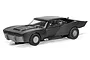A 1/32 scale Scalextric slot car model of the Batmobile from the 2022 film The Batman, shown in matte black on a white background.