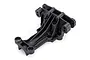 A black plastic Traxxas front upper bulkhead spare part for RC vehicles, shown from a high-angle studio perspective.