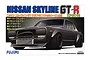 Fujimi 1/24 scale Nissan Skyline GT-R KPGC10 model kit box art showing a modified grey Hakosuka with an external oil cooler.