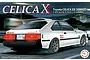 Box art for a Fujimi 1/24 scale Toyota Celica XX 2000GT plastic model kit showing a white car driving on a road at night.