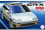 Box art for a Fujimi 1/24 scale Honda CR-X Si model kit featuring a silver car on a blue background.
