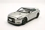 A silver 1/24 scale model of a Nissan R35 GT-R on a white background.