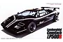 A studio shot of a black Lamborghini Countach LP500R model car with white racing stripes, shown from a high-angle front three-quarter view.
