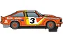 Side profile of a Scalextric 1/32 scale 1977 Holden A9X Torana slot car in orange livery with racing number 3 and various sponsor decals.