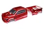 A red pre-painted RC truck body shell for an ARRMA Big Rock, featuring a separate cab and truck bed section on a white background.