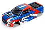 A pre-painted blue, red, and white ARRMA Granite Grom RC truck body shell viewed from a high angle against a white background.