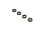 Four ARRMA rubber shielded ball bearings arranged in a diagonal line against a white background.
