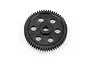 A black plastic spur gear with a central hole and six surrounding circular cutouts, isolated on a white background.