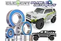 A collection of metal ball bearings with blue rubber seals arranged in front of images of Element RC Trailrunner and Knightrunner remote control trucks.