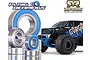 A collection of metal ball bearings with blue rubber seals displayed next to an ARRMA Gorgon RC monster truck.