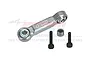A silver GPM Racing aluminium drag link with two black screws and a small metal nut, set against a branded background.