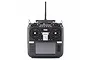 Front view of a black Radiomaster TX16S Mk 2 radio transmitter with a central screen, dual gimbals, and various switches and knobs.