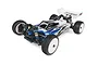 Team Associated RC10 B74.2 1/10 scale 4WD electric RC buggy with a blue, white, and black body shell and white wheels.