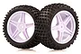 Two black rubber RC buggy tyres mounted on five-spoke white plastic rims against a white background.