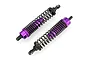 Two purple anodized aluminium RC shock absorbers with black springs on a white background.