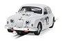 A 1/32 scale Scalextric Jaguar MK1 slot car in white with number 12 racing livery, shown on a track section.