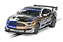 Scalextric 1/32 scale Ford Mustang GT4 slot car in Multimatic Motorsport livery on a track.