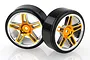 Two RC drift wheels with smooth black plastic tyres and five-spoke orange and chrome rims against a white background.