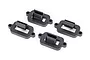 Four black plastic Traxxas body mount latches arranged on a white background.