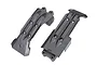 Two black plastic Traxxas RC skid plates for front and rear chassis protection, shown from an overhead angle against a white background.