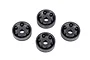 Four black plastic wheel washers for Traxxas RC vehicles arranged on a white background.