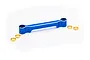 A blue anodized aluminium steering draglink for an RC car, accompanied by four small brass-coloured metal bushings, isolated on a white background.