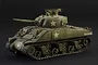 A weathered 1/56 scale plastic model of an M4 Sherman tank painted in olive drab with white star markings on a dark background.