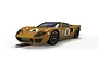 A studio shot of a gold Scalextric 1/32 scale 1968 Ford GT40 slot car, number 8, on a white background.