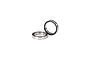 Two rubber shielded ball bearings for RC vehicles, one lying flat and one standing upright against a white background.