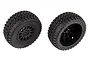 Two black RC off-road tyres pre-mounted on matte black Method-style wheels against a white background.