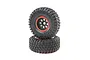 Two Losi 1/6 scale Creepy Crawler LT RC crawler tyres mounted on black rims with red beadlock-style rings, stacked on a white background.