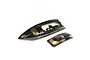 Pro Boat Heat Wave RC boat hull and matching canopy in black and gold finish, shown from a high angle on a white background.