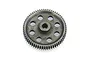A grey steel 64T spur gear for RC cars, featuring a central hub and eight circular weight-reduction holes, isolated on a white background.