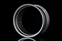 A silver inner rim component for an RC car wheel, shown against a black background with a reflection.
