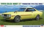 Box art for a Hasegawa 1/24 scale 1970 Toyota Celica 1600GT model kit featuring a yellow car parked in a grassy field by the sea.